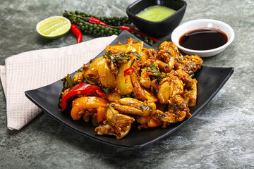 Vietnamese cuisine - fried frog with vegetables