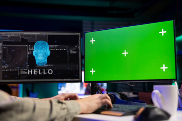 Software programmer watching AI on isolated screen PC gaining consciousness. Computer engineer...