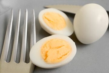 Fresh boiled quail eggs on grey background