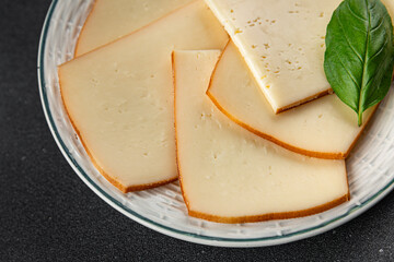 Raclette cheese tasty food dish fresh delicious gourmet food background on the table rustic food top view copy space top view