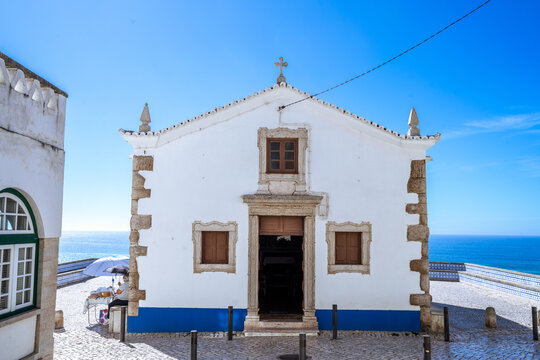 Ericeira Portugal - September 30 2024: Small Chapel of Nossa Senhora da Boa Viagem in Ericeira Portugal