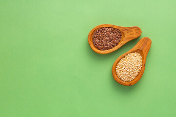 Healthy quinoa and flax seeds - Organic seeds in spoons.
