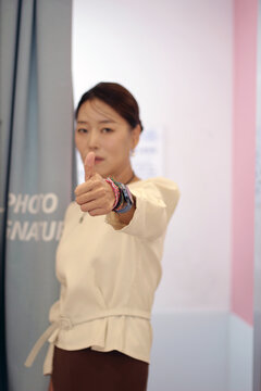 30s business woman posing as a business woman in studio