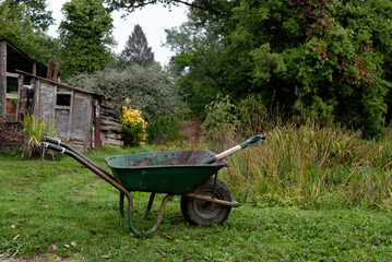Wheelbarrow and shovel in rural property