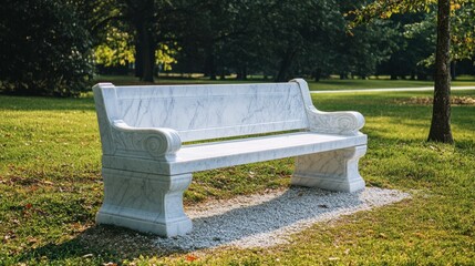 A polished white marble bench in a serene park setting, offering a peaceful place to sit.