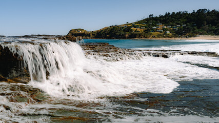 Lilyvale. Coastal View from Palm Jungle Loop Track, Royal National Park. Rugged Cliffs and Blue Ocean Waves Meeting the Rocky Shore. Burnings Palms Area, New South Wales,  Australia