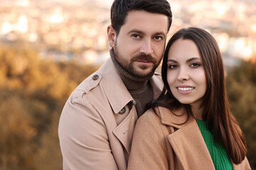 Fototapeta premium Portrait of beautiful couple outdoors on autumn day