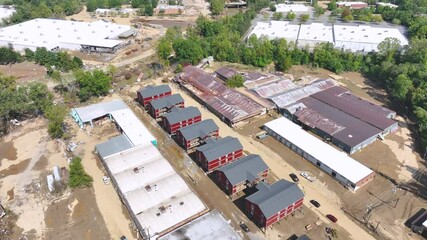 Aerial video of flood damage along the Swannanoa River near Asheville NC, 1 week after tropical storm Helene.