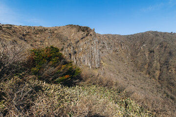 Hallasan National Park, Jeju island, South Korea, spring landscape view of Yeongsil trail, Halla volcano peak, trekking and climbing to Halla mountain, travel and hiking in Korea, Jeju-do, sunny day