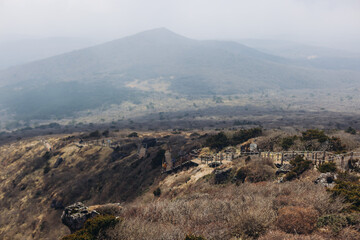 Hallasan National Park, Jeju island, South Korea, spring landscape view of Yeongsil trail, Halla volcano peak, trekking and climbing to Halla mountain, travel and hiking in Korea, Jeju-do, sunny day