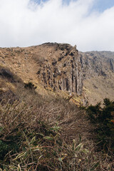Hallasan National Park, Jeju island, South Korea, spring landscape view of Yeongsil trail, Halla volcano peak, trekking and climbing to Halla mountain, travel and hiking in Korea, Jeju-do, sunny day