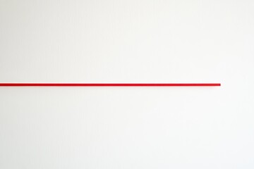 Obraz premium Simple black text on a white background with a small accent of a single red line, ideal for a striking, modern quote design.