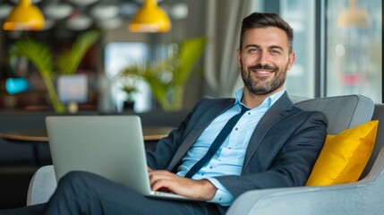 Fototapeta premium Professional Man Working in Contemporary Airport Lounge