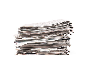 Stack of many newspapers isolated on white
