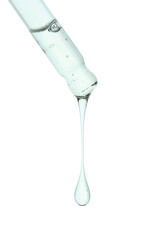 Cosmetic oil dripping from pipette on white background, closeup