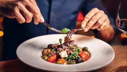 Faceless man eat Chianti in restaurant with bokeh background. Italian Food.