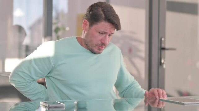 Middle Aged Man having Back Pain, Spasm