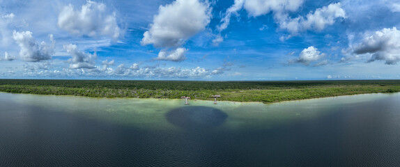 Laguna Kaan Luum aerial view. Located just outside Tulum Mexico is a lagoon with shallow clear waters popular among locals and tourists alike.