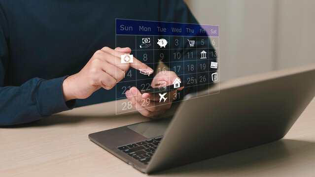 calendar to make management concept , working with note to smartphone and laptop. Managing The Finances Of The Business. Bill Payments, Income And Expense Tracking, Monthly Budget, Savings.