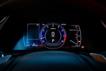 Close-up shot of a car's digital speedometer.Modern light car mileage (dashboard, milage). New display of a modern car.