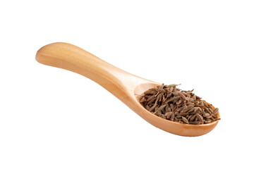 Dried cumin seeds in a wooden spoon on a white background. A cooking seasoning popular in the...