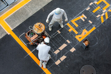 駐車場注意書きの文字入れ舗装工事