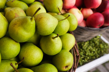 Green pears in a basket