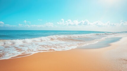 Fototapeta premium Tranquil Beach Scene with Gentle Waves and Clear Sky