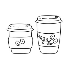Two coffee cups with lids and one has a leaf design