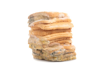 Stack of moldy bread, symbolizing spoiled food. The image highlights the risks of consuming moldy bread, emphasizing the health hazards associated with eating expired or contaminated food
