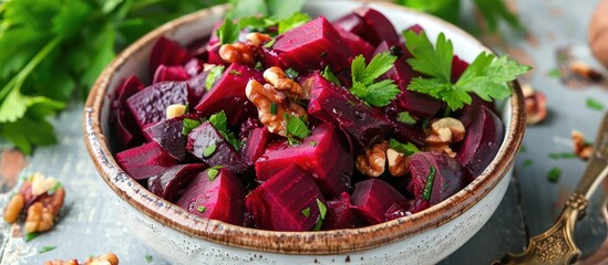 Beetroot Salad With Walnuts Dried Plums And Fresh Parsley In A Bowl