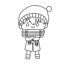 A boy in a hat and scarf is standing in the snow