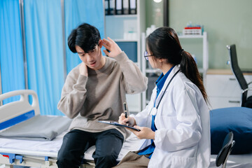 Doctor examining patient with symptoms in a clinic. Medical consultation and healthcare interaction.