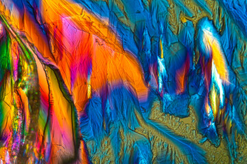 Abstract micrograph of valine crystals with polarization at 40x.
