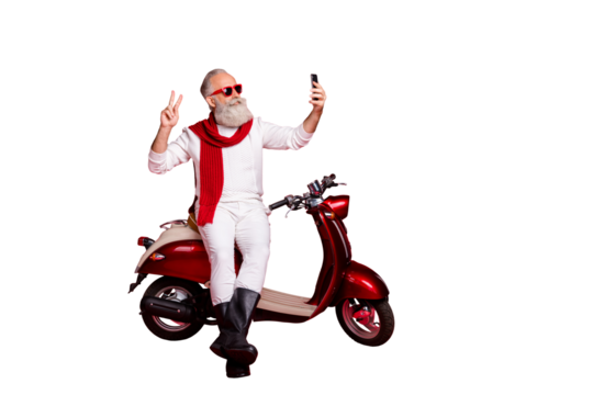 Portrait of his he nice attractive stylish trendy confident cheerful gray-haired man holding in hands phone taking making selfie showing v-sign isolated over bright vivid shine red background