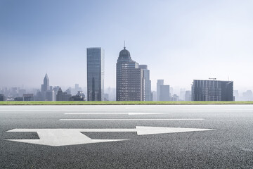 Urban Horizon: Stunning City Skyline with Road Perspective