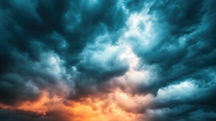 Obraz premium Dramatic dark stormy clouds with the sun breaking through creating a moody atmospheric and powerful landscape scene