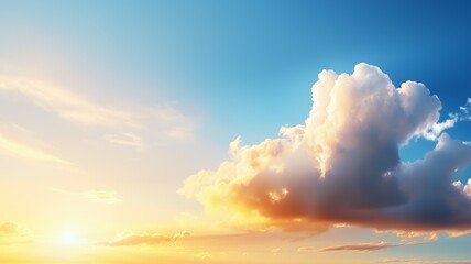 Golden sunlight illuminates fluffy clouds against a bright blue sky at dawn