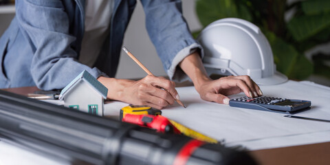 Engineer Conducting Measurements for Structural Design and Execution