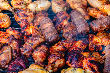 grilled meat over the coals on barbecue