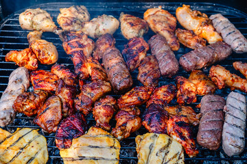 grilled meat over the coals on barbecue