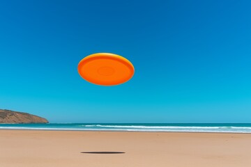 Dog is jumping in the air and catching a frisbee. The frisbee is orange and the dog is brown. dog jumping to catch a frisbee on a beach, with a blue sky and sea background.