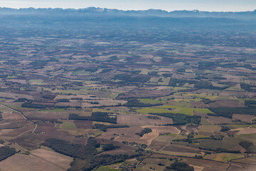 Aerial view over Toulouse city and the Occitania region in the south of France seen from a plane