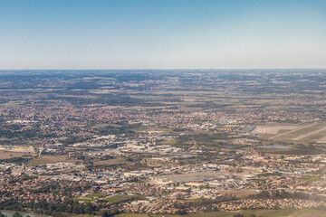 Aerial view over Toulouse city and the Occitania region in the south of France seen from a plane