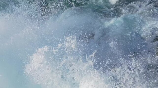 Foamy Rough Waves Crashing Onto Rocks At Seixo Branco Near Oleiros, A Coruna Province, Galicia, Spain. Close-up Shot