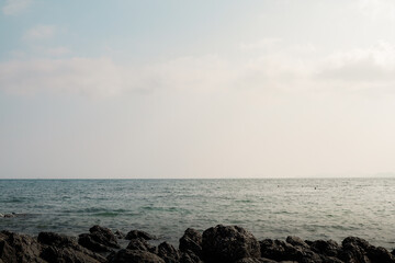 Landscape of rocks by the sea in the evening.