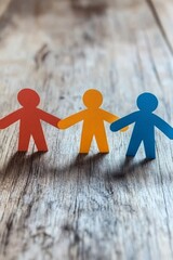 Diverse Paper Figures Uniting Together Symbolizing Community and Friendship