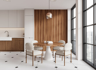 Home kitchen interior with cooking cabinet, dining table and panoramic window