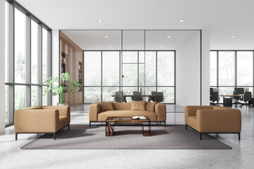 Modern office lounge with beige sofas and a glass coffee table. 3D Rendering