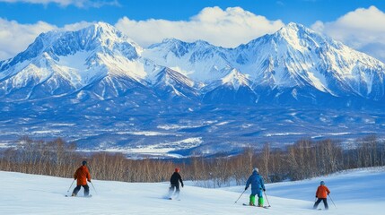 Snowboarders enjoying the view of Tokachidake and Daisetsuzan mountain ranges from the sunny, snow-covered slopes of Furano ski resort, ready for their next descent.